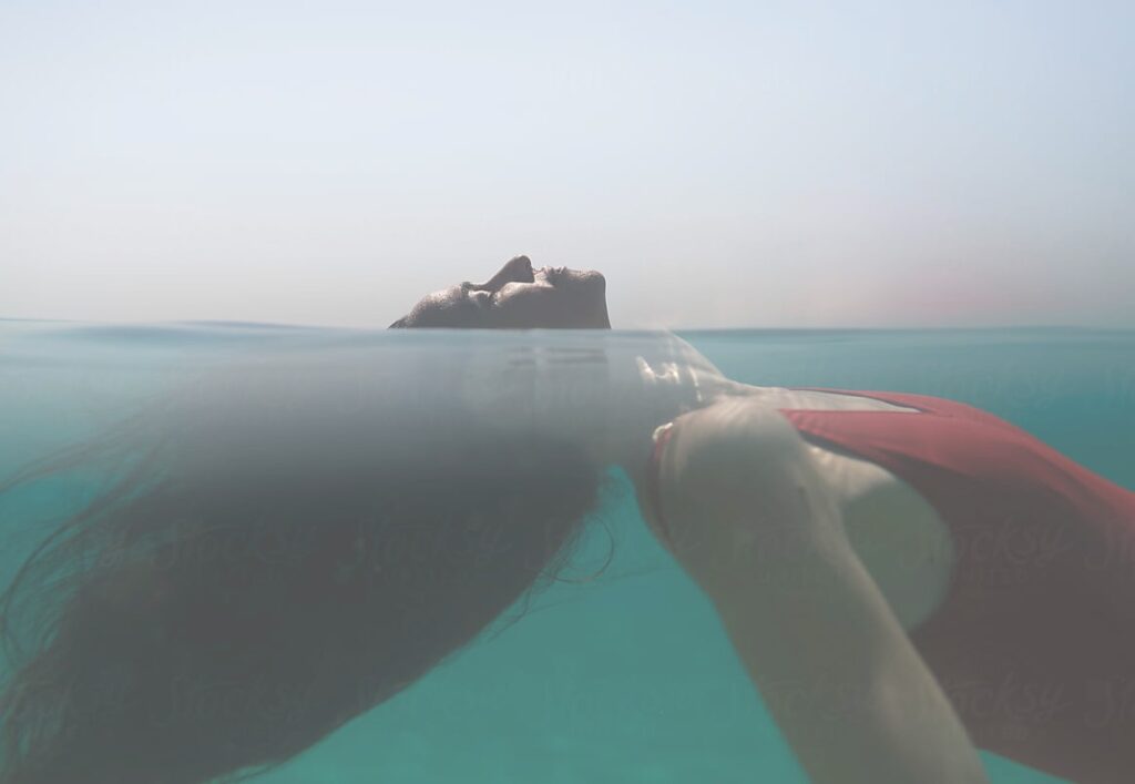 Light breaking through darkness - collective shadow healing Symbolic image of healing collective trauma